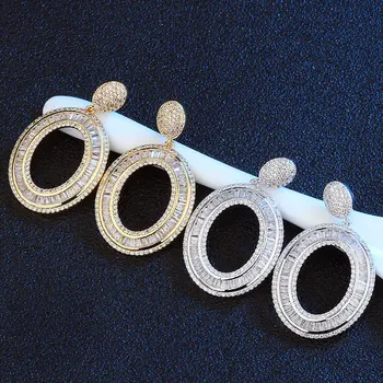 SINZRY hot predaj módne svadobné šperky cubic zirconia oválny dizajn prehnané visieť náušnice žena kreatívne svadobné šperky